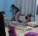 В Казахстане мать жестоко избила сына, привязав к батарее.webp